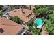An aerial shot features a pool in the backyard of this property, complemented by lush greenery and a meticulously maintained landscape at 1848 Indian Bend Dr, Henderson, NV 89074