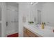 Neat bathroom featuring a walk-in shower with a glass enclosure and a light countertop at 1912 Summer Pine Ct # 103, Las Vegas, NV 89134