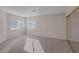Bright bedroom features neutral paint, carpet and natural light at 1912 Summer Pine Ct # 103, Las Vegas, NV 89134