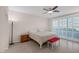 Cozy bedroom with shuttered windows and a ceiling fan at 1912 Summer Pine Ct # 103, Las Vegas, NV 89134