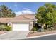 Inviting home with a two car garage, beautiful plants and desert landscaping at 1912 Summer Pine Ct # 103, Las Vegas, NV 89134