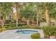 Relax in the community hot tub surrounded by lush landscaping and mature trees for privacy at 1912 Summer Pine Ct # 103, Las Vegas, NV 89134