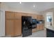 Kitchen with built in oven/microwave combination and large built in refrigerator at 1912 Summer Pine Ct # 103, Las Vegas, NV 89134
