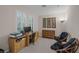 The spacious sitting area with an adjacent office area offers a tranquil space at 1912 Summer Pine Ct # 103, Las Vegas, NV 89134