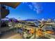Wide angle balcony view of the Las Vegas Strip at twilight featuring an illuminated cityscape at 200 Hoover Ave # 912, Las Vegas, NV 89101
