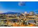 Beautiful Las Vegas cityscape view at dusk showcasing vibrant city lights and scenic mountain backdrop at 200 Hoover Ave # 912, Las Vegas, NV 89101