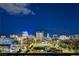 Night view of the illuminated Las Vegas cityscape showing high-rise buildings and bright city lights at 200 Hoover Ave # 912, Las Vegas, NV 89101
