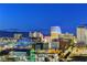 Beautiful dusk cityscape in Las Vegas featuring hotels and skyline with mountain views at 200 Hoover Ave # 912, Las Vegas, NV 89101