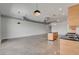 Bright modern kitchen with an island, concrete floor, and exposed ductwork at 200 Hoover Ave # 912, Las Vegas, NV 89101