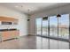 Contemporary kitchen with modern cabinets, countertops, and a sliding glass door showcasing city views at 200 Hoover Ave # 912, Las Vegas, NV 89101
