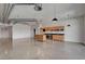 Spacious living area featuring a modern kitchen, concrete floors, and exposed ductwork at 200 Hoover Ave # 912, Las Vegas, NV 89101