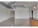 Open living space with minimalist design, concrete floors, and exposed ductwork at 200 Hoover Ave # 912, Las Vegas, NV 89101