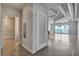 Spacious open-concept living area with exposed ductwork and expansive windows offering city views at 200 Hoover Ave # 912, Las Vegas, NV 89101