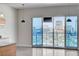 Living room showcasing sliding glass doors leading to a balcony with gorgeous city views at 200 Hoover Ave # 912, Las Vegas, NV 89101