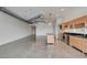 Open-concept living space showing stainless steel appliances, modern cabinetry and island in kitchen and spacious area at 200 Hoover Ave # 912, Las Vegas, NV 89101