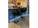 Eat in kitchen featuring tile floors and two barstool seats at 210 E Flamingo Rd # 419, Las Vegas, NV 89169