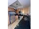 Compact kitchen with stainless steel appliances, black countertops and wooden cabinets at 210 E Flamingo Rd # 419, Las Vegas, NV 89169