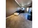 Inviting living room featuring tile floors, a comfortable couch and neutral colors at 210 E Flamingo Rd # 419, Las Vegas, NV 89169