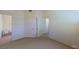 Open and bright bedroom showcases neutral walls and carpet, perfect for personalization at 2141 Hussium Hills St # 102, Las Vegas, NV 89108