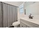 Neat bathroom with a shower, toilet, modern vanity, and elegant fixtures at 2714 Cottonwillow St, Las Vegas, NV 89135