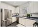 Bright kitchen with stainless steel appliances and white cabinetry at 2714 Cottonwillow St, Las Vegas, NV 89135