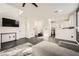 Bright and open living room showcasing modern decor, adjoining kitchen at 2714 Cottonwillow St, Las Vegas, NV 89135
