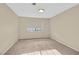 Cozy bedroom featuring neutral carpeting, window for natural light and light-colored walls at 2851 S Valley View Blvd # 1026, Las Vegas, NV 89102