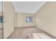 Comfortable bedroom with mirrored closet doors, carpet flooring, and a window at 2851 S Valley View Blvd # 1026, Las Vegas, NV 89102