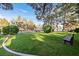 Relaxing community common area featuring green grass and several trees and seating at 2851 S Valley View Blvd # 1026, Las Vegas, NV 89102