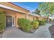 Charming front entrance showcasing a decorative door, well-maintained landscaping, and a covered walkway at 2851 S Valley View Blvd # 1026, Las Vegas, NV 89102