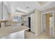 Bright kitchen with updated appliances, a breakfast bar, and ample counter space at 2851 S Valley View Blvd # 1026, Las Vegas, NV 89102