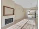 Open floor plan reveals living area with fireplace, with the kitchen in the background at 2851 S Valley View Blvd # 1026, Las Vegas, NV 89102