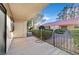 Relaxing patio with black fence and trimmed green bushes for added privacy at 2851 S Valley View Blvd # 1026, Las Vegas, NV 89102