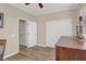Bright bedroom with wood-look floors and storage, creating a cozy atmosphere at 31 Via Mantova # 1, Henderson, NV 89011