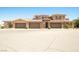 Charming multi-story home featuring a three-car garage and well-maintained desert landscaping at 31 Via Mantova # 1, Henderson, NV 89011