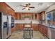 Modern kitchen featuring stainless steel appliances and ample cabinet space at 31 Via Mantova # 1, Henderson, NV 89011