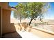 Private patio offering panoramic views of the surrounding natural desert landscape at 31 Via Mantova # 1, Henderson, NV 89011