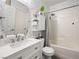 Clean bathroom featuring a shower-tub combo with modern sink and fixtures at 334 Shimmering Moon St, Henderson, NV 89015