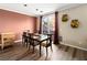 Elegant dining area adjacent to sliding door for optimal outdoor lighting at 334 Shimmering Moon St, Henderson, NV 89015