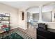Open-concept game room with modern decor, ping pong table, and archway entrance at 334 Shimmering Moon St, Henderson, NV 89015