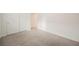 Carpeted bedroom featuring bright white walls and white closets at 376 Yellow Finch Ln, Henderson, NV 89012