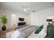 Inviting bedroom with a neutral color scheme, closet, and an ensuite bathroom at 376 Yellow Finch Ln, Henderson, NV 89012