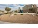 Community playground featuring a slide and climbing structure, set in a landscaped area with seating at 376 Yellow Finch Ln, Henderson, NV 89012