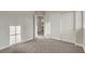 This bedroom has neutral colored walls, trim and carpet with a sliding door closet at 3794 Cape Royal St, Las Vegas, NV 89147