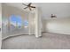 Large bonus room features carpeted flooring, neutral paint, and lots of natural light at 3794 Cape Royal St, Las Vegas, NV 89147
