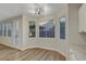 Kitchen nook with hardwood flooring, lots of natural light, and neutral paint at 3794 Cape Royal St, Las Vegas, NV 89147