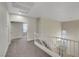 Landing featuring carpeted flooring, neutral paint, and a white railing at 3794 Cape Royal St, Las Vegas, NV 89147