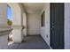Inviting covered entryway featuring sturdy support pillars and a secure front door at 3961 Bayamon St, Las Vegas, NV 89129