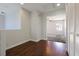 Hallway with wood floors leading to a bedroom with carpet at 3961 Bayamon St, Las Vegas, NV 89129