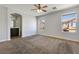 The main bedroom offers carpet, ceiling fan and attached bath with great natural light at 3961 Bayamon St, Las Vegas, NV 89129